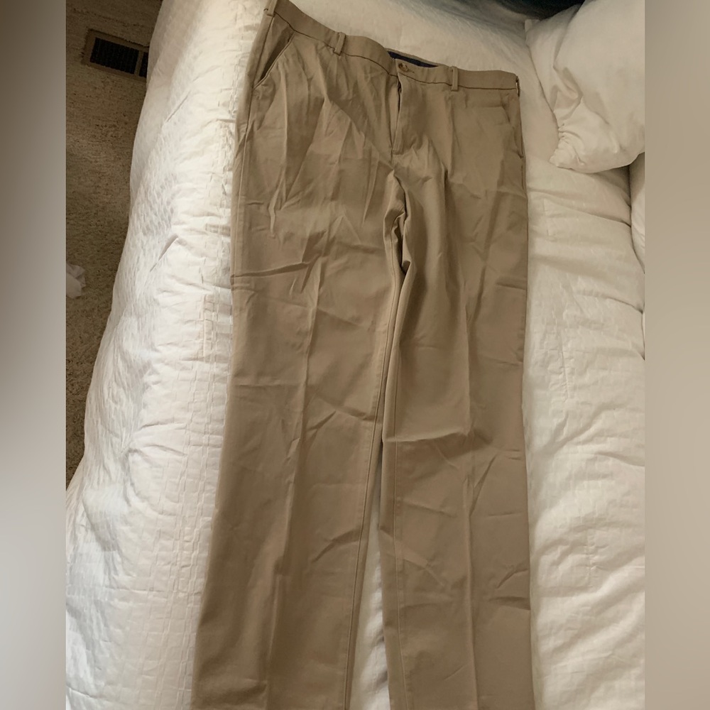 Men’s Izod khaki slacks, 38x34, good condition.